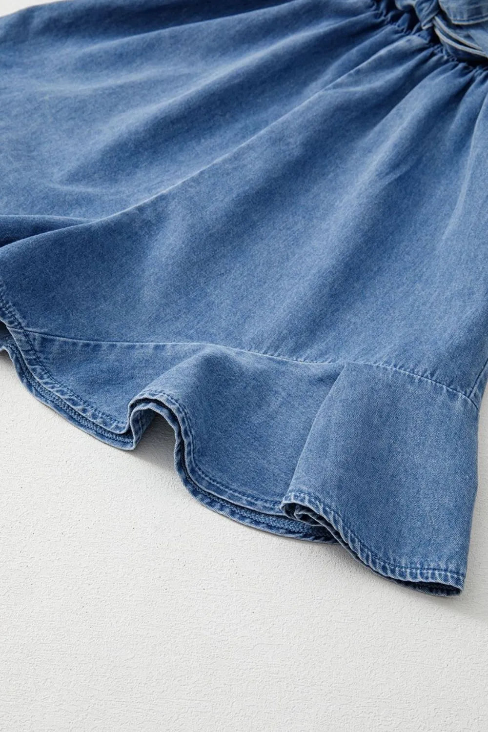Spaghetti Straps V Neck Belted Ruffled Leg Chambray Romper - Valley Mimosa